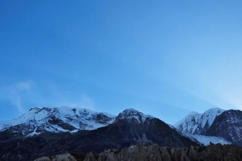 Sun rays in the sky over the Himalayas Stock Photos