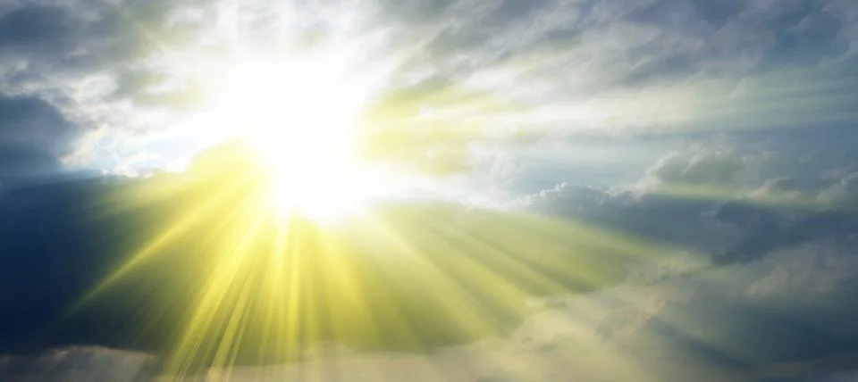 Sun rays sprouting through the clouds   Paradise Foto stock