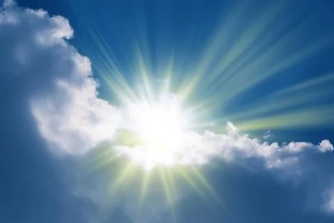 Sun rays sprouting through the clouds   Paradise Foto stock