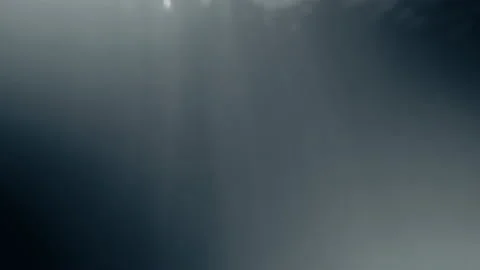 Sun Rays Stream Through the Surface of O... | Stock Video | Pond5