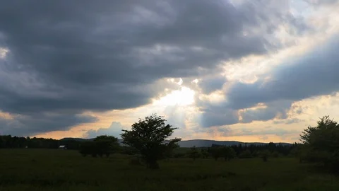 Sun Rays Streaming Through Dramatic Clouds Time Lapse 库存影片 122353254