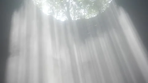 Sun Rays Streaming Through Goa Jomblang Caves Stock Footage 146103900