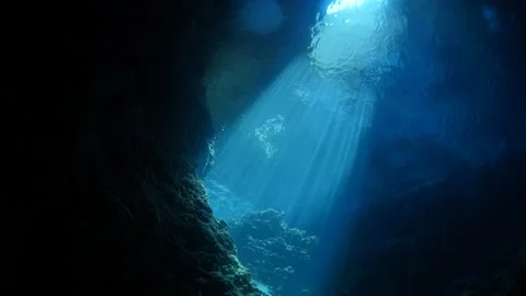 Sun rays sun beams sun shine underwater in cave beautiful light scenery in ocean Stock Footage 166388224