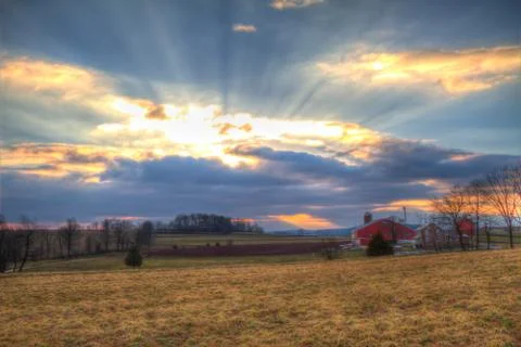 Sun Rays at sunset Stock Photos
