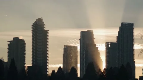 Sun Rays Through The City - 4K Stock Footage 169314675