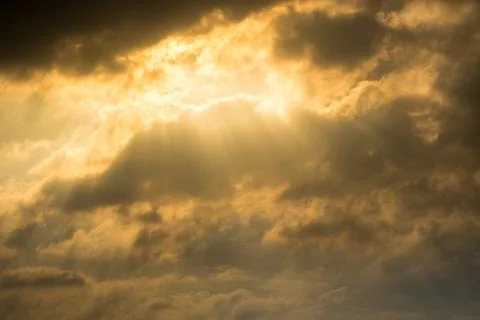 Sun rays through clouds like an dramatic explosion Stock-Fotos