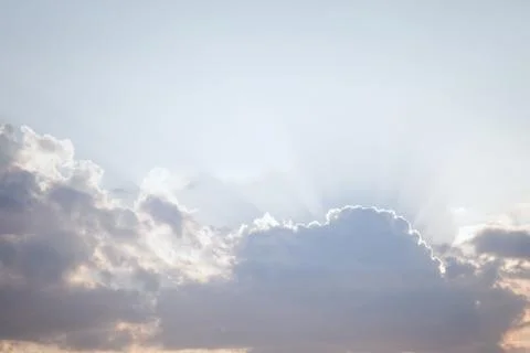 Sun rays through the clouds Stock Photos