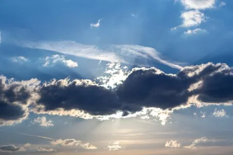 Sun rays through the clouds Stock Photos