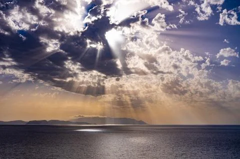 Sun rays through the clouds Fotos Stock