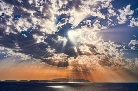 Sun rays through the clouds Фото