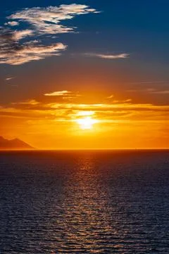 Sun rays through the clouds Stock Photos