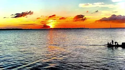 Sun Rays Through Clouds On Sea Beach Reflection Boat Stock Footage 264808353