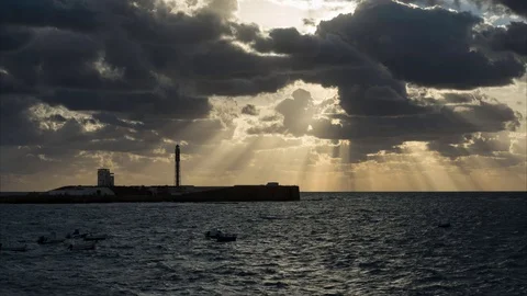 Sun Rays Through the Clouds Time-Lapse Stock Footage 99022506