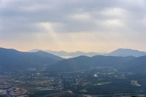 Sun Rays Through Clouds. Wiew of Sanya Bay Stock Photos