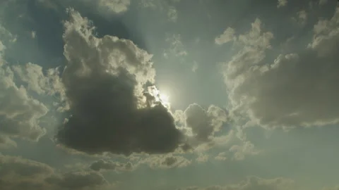 Sun rays through floating clouds. Time lapse Stock Footage 285899687