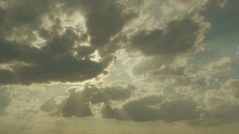 Sun rays through floating clouds. Time lapse Stock Footage 285902137