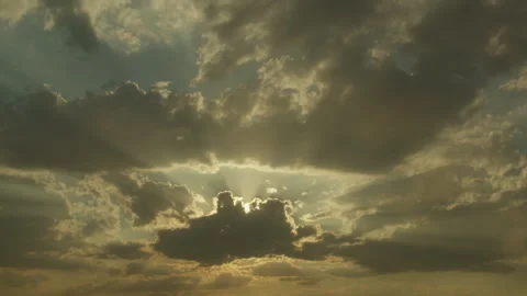 Sun rays through floating clouds. Time lapse Stock Footage 291006558