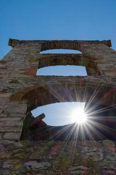 Sun rays through the opening of al tower Stock Photos
