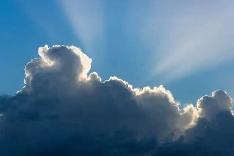 Sun rays from thunderclouds Stock Photos