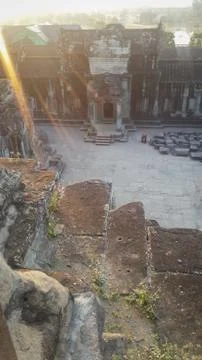 Sun rays from the top of a tower in Angkor Wat temple in Cambodia Stock Photos