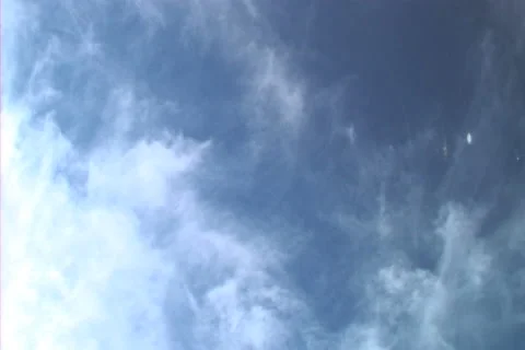 Sun reflected clouds Stock Footage 1086640