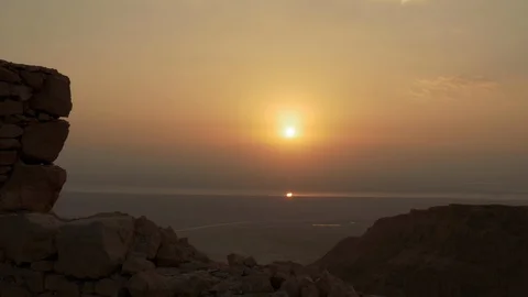 Sun reflected at dead sea water at morning sunrise Stock Footage 101069152