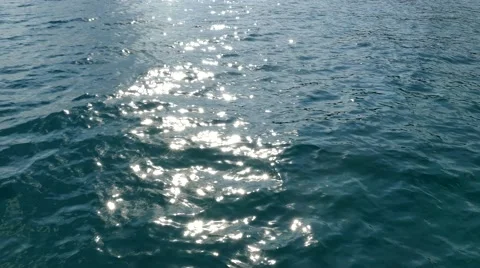 Sun reflected on a deep blue ocean background Stock Footage 68148527