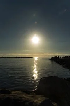 Sun reflected in the sea Stock Photos