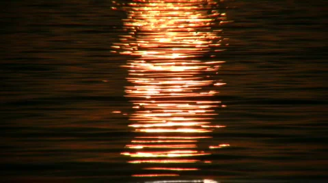 Sun is reflected off surface of the water (High Definition) Stock Footage 364976
