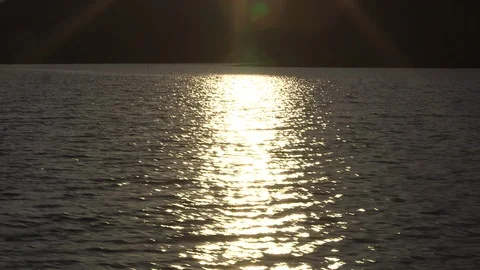 Sun reflected on the  water in the Arctic Ocean, Greenland Stock Footage 103359778