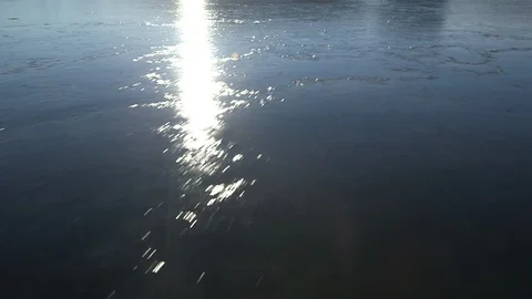 Sun reflected on the  water in the Arctic Ocean, Greenland Video stock 104185606