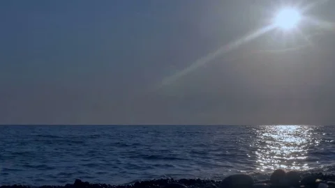 The sun is reflected in the water. Waves in the sea. Stock Footage