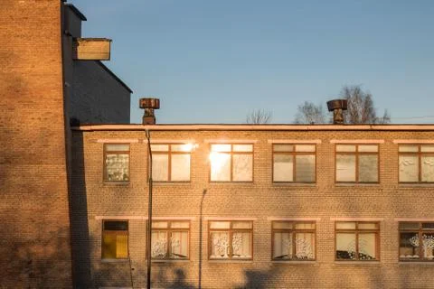 The sun is reflected in windows of building Stock Photos