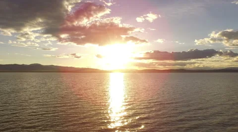 Sun Reflecting on a Lake Stock Footage 63357380