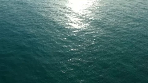 Sun reflecting on middle of sea surface Stock Footage 106780657