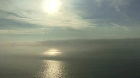 Sun reflecting on ocean Stock Footage 128013