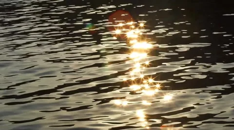 Sun Reflecting Off Rippling Water Video stock 62780789