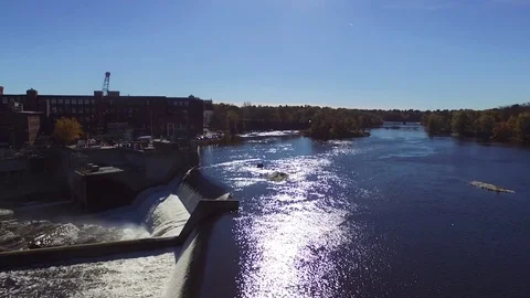 Sun Reflecting Off of River Dam Video stock 97533803