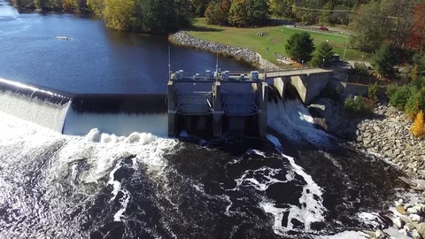 Sun Reflecting Off of Rushing River Dam Video stock 97534333