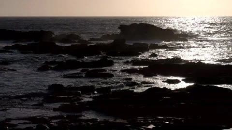 The sun reflecting on the sea at sunset at low tide. Stock Footage 335168659