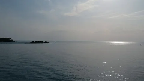Sun reflecting on sea surface 動画素材 106780658