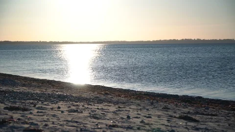Sun reflecting in seawater Stock Footage 127934599