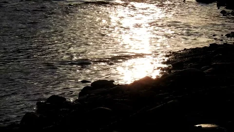 Sun reflecting in a small river Stock Footage 89671304