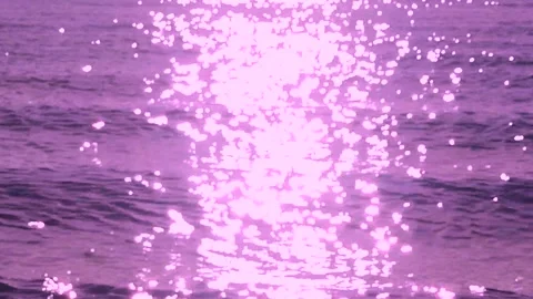 Sun Reflecting on Sparkling Blue Sea, Ocean at Sunset, Sunrise.  Stock Footage 244119698
