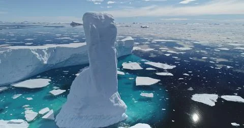 Sun reflection at arctic ocean with melt iceberg aerial. Environment ecological Stock Photos