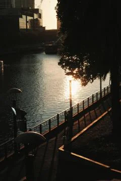 Sun reflection over the river in the city Stock-Fotos