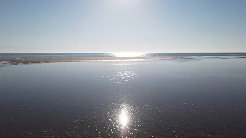 Sun reflection on the sand beach Stock Footage 106941003