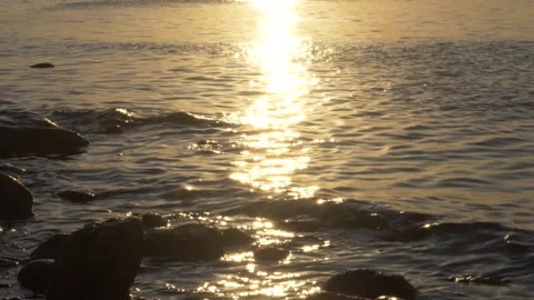 Sun Reflection Shimmering On Waves During Sunset Slow Motion 180FPS Video stock 169091515