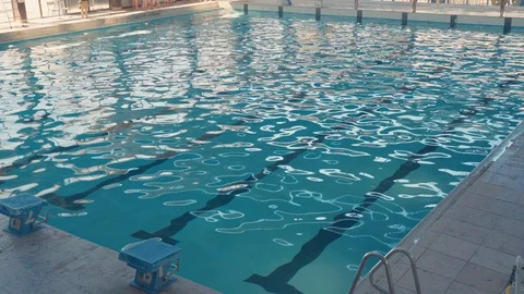 Sun reflection on a swimming pool Stock Footage 109500536