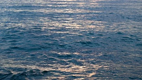 Sun reflection on water surface at sunset. Waves on the sea. Stock Footage 234092634